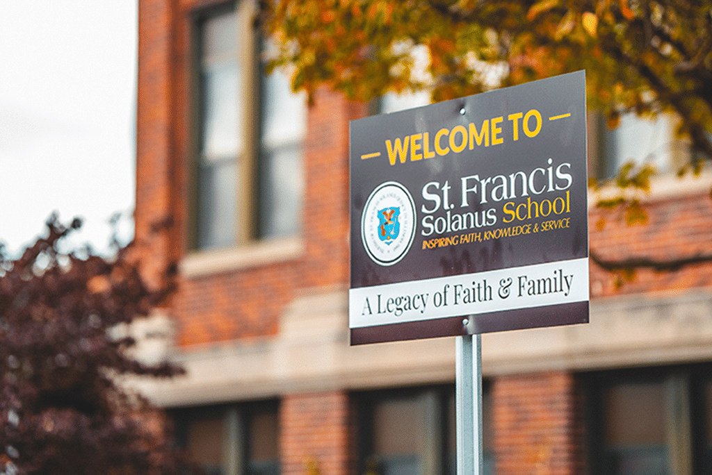 Close Up of Welcome Sign at St. Francis