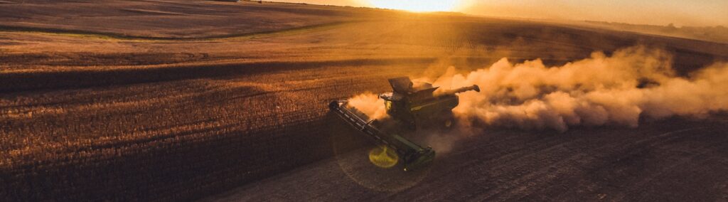 aerial shot of harvester in bean field