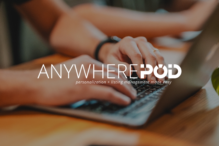person typing on laptop with Anywhere POD logo over the image